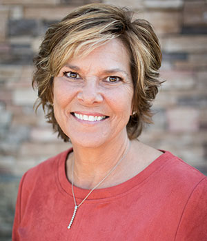 SUE ANNE TINYO - Director of Client Affairs